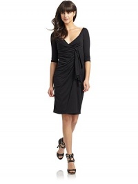 THE LOOKPullover styleCrossover v-neckThree-quarter length sleevesDraped and ruched detailsCascading ruffled accentCamisole dress underlayTHE FITAbout 39 from shoulder to hemTHE MATERIAL60% silk/40% modalCARE & ORIGINDry clean ImportedModel shown is 5'10 (177cm) wearing US size 4. THE LOOKPullover styleCrossover v-neckThree-quarter length sleevesDraped and ruched detailsCascading ruffled accentCamisole dress underlayTHE FITAbout 39 from shoulder to hemTHE MATERIAL60% silk/40% modalCARE & ORIGINDry clean ImportedModel shown is 5'10 (177cm) wearing US size 4.