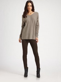 Draped wool and cashmere v-neck has dropped shoulders, long dolman sleeves and a hi-low hem that hits below the hips. V-neckDropped shouldersLong dolman sleevesHi-low hem hits below the hips70% wool/30% cashmereDry cleanImportedModel shown is 5'10 (177cm) wearing US size Small. Draped wool and cashmere v-neck has dropped shoulders, long dolman sleeves and a hi-low hem that hits below the hips. V-neckDropped shouldersLong dolman sleevesHi-low hem hits below the hips70% wool/30% cashmereDry cleanImportedModel shown is 5'10 (177cm) wearing US size Small.