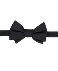 Add some top of the line polish to any sophisticated combination and pair this Tommy Hilfiger bow tie with his best black suits.