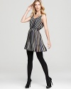 Pretty pleats and contrast stripes energize this breezy dress with color and fun.