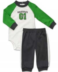 Give a shout-out to one of his favorite all-stars with this sporty bodysuit and pant set from Carter's. Give a shout-out to one of his favorite all-stars with this sporty bodysuit and pant set from Carter's.