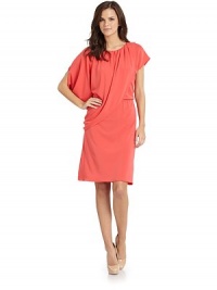THE LOOKGathered round necklineSide draped self overlayCap sleevesElastic waistTHE FITAbout 40 from shoulder to hemTHE MATERIAL70% rayon/24% polyester/6% spandexCARE & ORIGINDry cleanImportedModel shown is 5'9½ (176cm) wearing US size Small. THE LOOKGathered round necklineSide draped self overlayCap sleevesElastic waistTHE FITAbout 40 from shoulder to hemTHE MATERIAL70% rayon/24% polyester/6% spandexCARE & ORIGINDry cleanImportedModel shown is 5'9½ (176cm) wearing US size Small.
