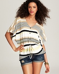 Graphic stripes and an easy shape make this Red Haute top ideal for a beachy getaway. Channel sixties screen sirens on the French Riviera with slim capris and oversize shades. Graphic stripes and an easy shape make this Red Haute top ideal for a beachy getaway. Channel sixties screen sirens on the French Riviera with slim capris and oversize shades.
