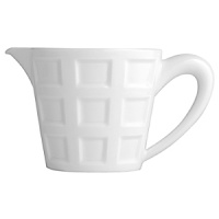 Architectural, white Limoges china with subtle relief patterns. Inspired by the coffered ceilings of Renaissance castles, its geometric motif emphasizes the sense of depth and quality of the material. Accessories shown: Beverage server, creamer, sugar, soup bowl. Architectural, white Limoges china with subtle relief patterns. Inspired by the coffered ceilings of Renaissance castles, its geometric motif emphasizes the sense of depth and quality of the material. Accessories shown: Beverage server, creamer, sugar, soup bowl.