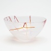 Each unique, this artistic bowl, designed by Anna Ehrner features swirling lines and veils of color.