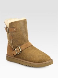 Adjustable buckle straps top this suede essential lined with ultra-soft shearling. Shaft, 7½Leg circumference, 13½Suede upperPull-on style with adjustable strapsShearling liningRubber trek solePadded insoleImportedThis style runs true to size. We recommend ordering your usual size for a standard fit. Adjustable buckle straps top this suede essential lined with ultra-soft shearling. Shaft, 7½Leg circumference, 13½Suede upperPull-on style with adjustable strapsShearling liningRubber trek solePadded insoleImportedThis style runs true to size. We recommend ordering your usual size for a standard fit.