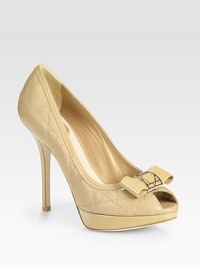 Peep toe silhouette in timeless quilted leather, topped with patent leather trim and a hardware-embellished bow. Self-covered heel, 5 (125mm)Covered platform, 1 (25mm)Compares to a 4 heel (100mm)Leather upperLeather liningBuffed leather solePadded insoleMade in ItalyOUR FIT MODEL RECOMMENDS ordering one half size up as this style runs small. Peep toe silhouette in timeless quilted leather, topped with patent leather trim and a hardware-embellished bow. Self-covered heel, 5 (125mm)Covered platform, 1 (25mm)Compares to a 4 heel (100mm)Leather upperLeather liningBuffed leather solePadded insoleMade in ItalyOUR FIT MODEL RECOMMENDS ordering one half size up as this style runs small.