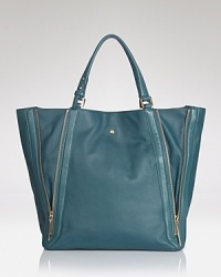 Sleek, structured, and oh-so spacious, this Pour La Victoire tote looks pulled together but keeps its sense of cool. A snap closure opens to an interior that can expand for added storage. Sleek, structured, and oh-so spacious, this Pour La Victoire tote looks pulled together but keeps its sense of cool. A snap closure opens to an interior that can expand for added storage.