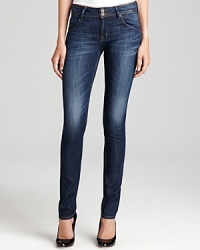 A rich dark wash and clean five-pocket silhouette make these Hudson skinny jeans a chic minimalist alternative to everyday denim. A rich dark wash and clean five-pocket silhouette make these Hudson skinny jeans a chic minimalist alternative to everyday denim.