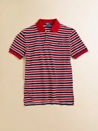 A timelessly preppy short-sleeved polo shirt in lightweight, striped cotton.Shirt collarShort sleevesButton-frontRibbed collar and armbandsUneven vented hemCottonMachine washImported Please note: Number of buttons may vary depending on size ordered. A timelessly preppy short-sleeved polo shirt in lightweight, striped cotton.Shirt collarShort sleevesButton-frontRibbed collar and armbandsUneven vented hemCottonMachine washImported Please note: Number of buttons may vary depending on size ordered.
