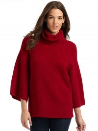 THE LOOKCozy, textured knit constructionCowlneckDraped, three-quarter length dolman sleevesTHE FITAbout 25 from shoulder to hemTHE MATERIALWool/nylonCARE & ORIGINHand washImportedModel shown is 5'9½ (176cm) wearing US size Small. THE LOOKCozy, textured knit constructionCowlneckDraped, three-quarter length dolman sleevesTHE FITAbout 25 from shoulder to hemTHE MATERIALWool/nylonCARE & ORIGINHand washImportedModel shown is 5'9½ (176cm) wearing US size Small.