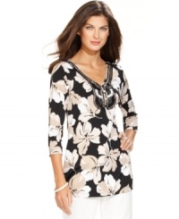Update your spring wardrobe with this versatile Ellen Tracy tunic. The neutral colors make it an easy match with trousers and skirts; the applique at the chest adds a luxe touch, too! Update your spring wardrobe with this versatile Ellen Tracy tunic. The neutral colors make it an easy match with trousers and skirts; the applique at the chest adds a luxe touch, too!