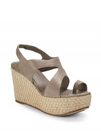 THE LOOKToe ringCutout leather upperElastic slingback strapWoven espadrille wedge, 3½ (90mm)Woven espadrille platform, 1½ (40mm)Compares to a 2 heel (50mm)THE MATERIALLeather upperLeather liningLeather and rubber soleORIGINImported