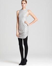 Lavished with sparkling silver sequins, this statuesque Dolve Vita dress, shimmers, glimmers and shines! Lavished with sparkling silver sequins, this statuesque Dolve Vita dress, shimmers, glimmers and shines!