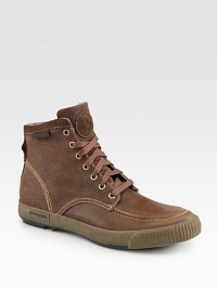 A new standard in casual style, uniquely crafted in leather and canvas with contrast stitching and a comfortable rubber sole.Leather/canvas upperPadded insoleRubber soleImported A new standard in casual style, uniquely crafted in leather and canvas with contrast stitching and a comfortable rubber sole.Leather/canvas upperPadded insoleRubber soleImported