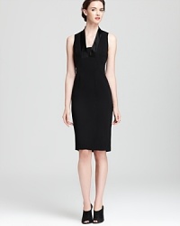 The standard LBD gets a luxe new attitude as sleek satin panels accentuate a striking Anne Klein dress. Finish the look with chic shots of silver and send the style into overdrive. The standard LBD gets a luxe new attitude as sleek satin panels accentuate a striking Anne Klein dress. Finish the look with chic shots of silver and send the style into overdrive.