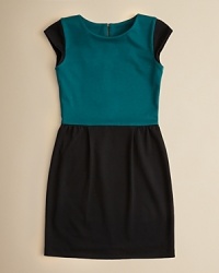 Aqua's cute colorblock dress works with modest proportions and coy cap sleeves for an all-around dress she'll feel fabulous in. Aqua's cute colorblock dress works with modest proportions and coy cap sleeves for an all-around dress she'll feel fabulous in.
