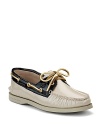 Metallic leather accents add subtle sparkle to a classic boat shoe from Sperry Top-Sider.