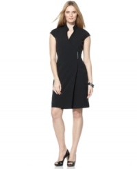 Calvin Klein gives the classic wrap a contemporary update with this petite dress, adding a chic mandarin collar and a sleek hardware closure at the waist. Calvin Klein gives the classic wrap a contemporary update with this petite dress, adding a chic mandarin collar and a sleek hardware closure at the waist.