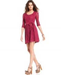 The allover lace adds a romantic appeal to this Kensie dress, polished off with a bow-tie belt! The allover lace adds a romantic appeal to this Kensie dress, polished off with a bow-tie belt!