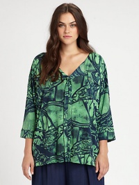 This dolman blouse features a brilliant print and offers you a relaxed-yet-feminine fit, enhanced by a hint of stretch.Feminine necklineThree-quarter sleevesAllover printAbout 30 from shoulder to hemVenezia/spandexDry cleanMade in USA