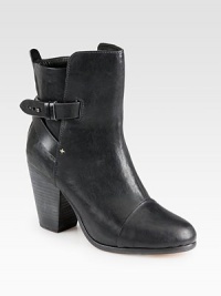 Ever-classic ankle boot in sumptuous leather with crisscrossed strap details for a subtle edge. Stacked heel, 3¾ (95mm)Leather upperPull-on style with adjustable ankle strap with metal pull-tabsLeather lining and solePadded insoleImported Ever-classic ankle boot in sumptuous leather with crisscrossed strap details for a subtle edge. Stacked heel, 3¾ (95mm)Leather upperPull-on style with adjustable ankle strap with metal pull-tabsLeather lining and solePadded insoleImported
