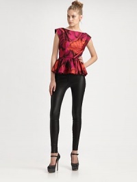 Utterly eye-catching in a vibrant abstract print, top-fitted with a shape-defining peplum at the waist.BoatneckPleated peplum waistCenter back zipperAbout 19 from shoulder to hemViscoseDry cleanImported of Italian fabricModel shown is 5'11 (180cm) wearing US size Small. Utterly eye-catching in a vibrant abstract print, top-fitted with a shape-defining peplum at the waist.BoatneckPleated peplum waistCenter back zipperAbout 19 from shoulder to hemViscoseDry cleanImported of Italian fabricModel shown is 5'11 (180cm) wearing US size Small.