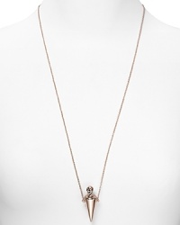 If Gothic glamor got a modern update, the result would look a lot like this. This House of Harlow 1960 cocktail necklace, works an edgy vibe with plated skull vile pendant. If Gothic glamor got a modern update, the result would look a lot like this. This House of Harlow 1960 cocktail necklace, works an edgy vibe with plated skull vile pendant.