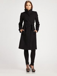 Warm wool/cashmere design is defined by clean lines and impeccable tailoring.Two-button stand collar Concealed button front Side buttoned pockets Self belt with buckle Belt loops Buttoned tabs on cuffs Back vent at hem 80% virgin wool/20% cashmere Dry clean Imported Warm wool/cashmere design is defined by clean lines and impeccable tailoring.Two-button stand collar Concealed button front Side buttoned pockets Self belt with buckle Belt loops Buttoned tabs on cuffs Back vent at hem 80% virgin wool/20% cashmere Dry clean Imported