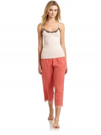 THE LOOKLace-trimmed slight v-neckAdjustable strapsTHE FITAbout 22 from shoulder to hemTHE MATERIAL90% nylon/10% lycraCARE & ORIGINHand washMade in USAModel shown is 5'10 (177cm) wearing US size Small. THE LOOKLace-trimmed slight v-neckAdjustable strapsTHE FITAbout 22 from shoulder to hemTHE MATERIAL90% nylon/10% lycraCARE & ORIGINHand washMade in USAModel shown is 5'10 (177cm) wearing US size Small.