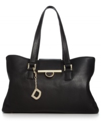 Designed for the diva who doesn't travel light, this spacious shopper from DKNY stashes all your essentials in style. Crafted of luxe leather with refined detailing, its destined to be your new fab favorite. Designed for the diva who doesn't travel light, this spacious shopper from DKNY stashes all your essentials in style. Crafted of luxe leather with refined detailing, its destined to be your new fab favorite.