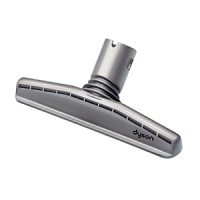 The Dyson Mattress tool attaches to the wand or hose on your Dyson vacuum cleaner to remove dirt, allergens and dust mites from mattresses and upholstery. The front and back edges gather, ball and release fibers into the airflow, where they are sucked away. The top is angled to distribute suction power evenly across the tool. The Dyson Mattress tool attaches to the wand or hose on your Dyson vacuum cleaner to remove dirt, allergens and dust mites from mattresses and upholstery. The front and back edges gather, ball and release fibers into the airflow, where they are sucked away. The top is angled to distribute suction power evenly across the tool.