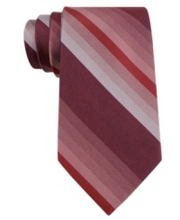 Get shaded: blended stripes on this Calvin Klein silk tie keep you from getting lost in the crowd. Get shaded: blended stripes on this Calvin Klein silk tie keep you from getting lost in the crowd.