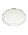 This versatile and stylish oval platter will coordinate perfectly with a variety of table linens and flatware. An ornate scroll motif trimmed in platinum adds a sophisticated sensibility to your tabletop.