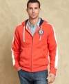 Casual goes colorful and bold with this hoodie from Tommy Hilfiger.