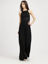 A goddess-inspired floor-length design with crossover details and semi-sheer stretch fabric. Halter necklineCrossover waistbandElastic ruching at waistCrossover open backAbout 47 from natural waist85% viscose/15% linenDry cleanImportedModel shown is 5'10 (177cm) wearing US size Small. A goddess-inspired floor-length design with crossover details and semi-sheer stretch fabric. Halter necklineCrossover waistbandElastic ruching at waistCrossover open backAbout 47 from natural waist85% viscose/15% linenDry cleanImportedModel shown is 5'10 (177cm) wearing US size Small.