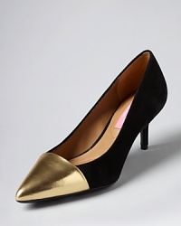 Designer Isaac Mizrahi takes a confidently bold stance on the pointed toe and cap toe styles, in this work-or-night out pair that feature oversized details paired with flirty kitten heels. Designer Isaac Mizrahi takes a confidently bold stance on the pointed toe and cap toe styles, in this work-or-night out pair that feature oversized details paired with flirty kitten heels.