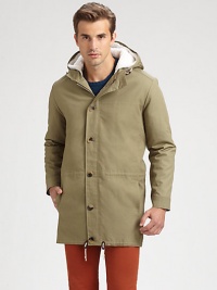 A cold weather essential with modern appeal, this sleek, minimalist design is enhanced with a faux-fur lining for endless warmth and comfort.Zip frontAttached drawstring hoodSide slash pocketsDrawstring hemAbout 33½ from shoulder to hemCottonDry cleanImported A cold weather essential with modern appeal, this sleek, minimalist design is enhanced with a faux-fur lining for endless warmth and comfort.Zip frontAttached drawstring hoodSide slash pocketsDrawstring hemAbout 33½ from shoulder to hemCottonDry cleanImported