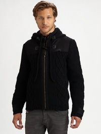 Classic cable knit lends a refined look to this zip-up, complete with stylish toggle closures. HoodFront zip and toggle closure Long ribbed cuff sleeves with button tabs Tonal shoulder panelsRibbed hem About 28 from shoulder to hem 50% wool/50% acrylicDry clean Imported Classic cable knit lends a refined look to this zip-up, complete with stylish toggle closures. HoodFront zip and toggle closure Long ribbed cuff sleeves with button tabs Tonal shoulder panelsRibbed hem About 28 from shoulder to hem 50% wool/50% acrylicDry clean Imported
