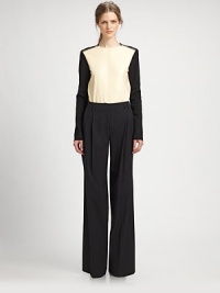 A supple leather front panel and a silk rib-knit back, accented with goldtone shoulder zippers.Jewel necklineShoulder zippersLeather front panelRib-knit back panelLonger back hemSilkDry cleanMade in ItalyModel shown is 5'11 (180cm) wearing US size 4. A supple leather front panel and a silk rib-knit back, accented with goldtone shoulder zippers.Jewel necklineShoulder zippersLeather front panelRib-knit back panelLonger back hemSilkDry cleanMade in ItalyModel shown is 5'11 (180cm) wearing US size 4.