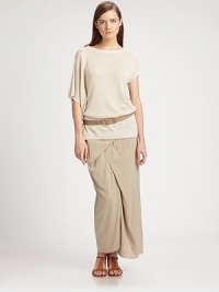 This soft, asymmetrical silk/linen knit style features an artfully draped, split batwing sleeve.Banded jewel necklineRight batwing sleeve with split shoulderLeft short sleeve with banded cuffRib-knit hemline75% linen/25% silkDry cleanMade in Italy of imported fabricModel shown is 5'9½ (176cm) wearing US size Small. This soft, asymmetrical silk/linen knit style features an artfully draped, split batwing sleeve.Banded jewel necklineRight batwing sleeve with split shoulderLeft short sleeve with banded cuffRib-knit hemline75% linen/25% silkDry cleanMade in Italy of imported fabricModel shown is 5'9½ (176cm) wearing US size Small.