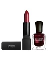 Deborah Lippmann is excited to introduce two additions to her new lip category for the holidays. When considering the winter season, she created lip and nail pairings that every woman can rely on for every rendezvous throughout the holidays. The lipstick maintains all of the qualities that are most important to her, delivering a long-lasting, lightweight and glossy finish. Similar to her polish, the formula is creamy, shiny, easy-to-use and available in very wearable and sophisticated hues.Reveling in the magical spirit of the season, Midnight Confessions is the holiday must-have duet for everyday wear. Under a Spell is a sheer, berry lip color that gives lips a natural, just-kissed flush with the perfect amount of shine. Completing the set is Bitches Brew, an opaque mulberry lacquer that is rich and shiny with a subtle hint of shimmer. The combination is very modern with its strong, opaque lacquer and sheer, natural-looking lip color.