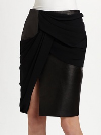 The classic pencil silhouette gets new life with luxe leather panels, an elegant drape and a bold front slit.Concealed side zipFront side ventDraped front and back panels, gathered at seamsAbout 26 from natural waistLeather; 96% viscose/4% elastaneSilk liningDry clean with leather professionalImportedModel shown is 5'10 (177cm) wearing US size 2. The classic pencil silhouette gets new life with luxe leather panels, an elegant drape and a bold front slit.Concealed side zipFront side ventDraped front and back panels, gathered at seamsAbout 26 from natural waistLeather; 96% viscose/4% elastaneSilk liningDry clean with leather professionalImportedModel shown is 5'10 (177cm) wearing US size 2.