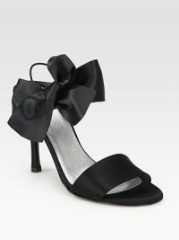Glimmering satin with an oversized bow, elastic slingback strap and skinny heel. Self-covered heel, 4 (100mm)Satin upperLeather lining and solePadded insoleImportedOUR FIT MODEL RECOMMENDS ordering true size. Glimmering satin with an oversized bow, elastic slingback strap and skinny heel. Self-covered heel, 4 (100mm)Satin upperLeather lining and solePadded insoleImportedOUR FIT MODEL RECOMMENDS ordering true size.