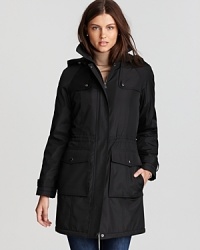 A tall pop-up collar, snap epaulets, cinched waist and oversized flap pockets with a clever layered side pocket highlight this Marc New York parka's military-chic inspiration. Faux fur lining adds luxe warmth. A tall pop-up collar, snap epaulets, cinched waist and oversized flap pockets with a clever layered side pocket highlight this Marc New York parka's military-chic inspiration. Faux fur lining adds luxe warmth.