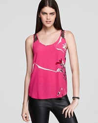 A pretty floral print and alluring back lace details give this French Connection tank an enchanting look, both coming and going. A pretty floral print and alluring back lace details give this French Connection tank an enchanting look, both coming and going.