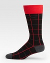 A captivating grid pattern lends modern flair to this simple dress sock shaped in a generous cotton blend with a hint of stretch for maximum comfort and support.Mid-calf heightCotton/polyamide/modal/elastaneMachine washImported