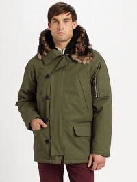 A modern interpretation of a classic style, this military style parka jacket exudes city-cool featuring zippered pockets on the sleeve and an attached faux-fur lined hood.Zip frontButton-front placketAttached faux-fur lined hoodWaist flap pocketsAbout 31 from shoulder to hemCottonDry cleanImported A modern interpretation of a classic style, this military style parka jacket exudes city-cool featuring zippered pockets on the sleeve and an attached faux-fur lined hood.Zip frontButton-front placketAttached faux-fur lined hoodWaist flap pocketsAbout 31 from shoulder to hemCottonDry cleanImported