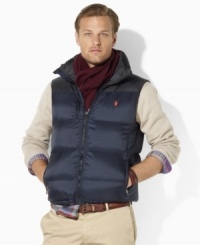Whether tackling the terrain on the slopes or trekking to the office, this water-resistant ripstop down vest offers the utmost in warmth and handsome style. Whether tackling the terrain on the slopes or trekking to the office, this water-resistant ripstop down vest offers the utmost in warmth and handsome style.