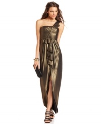 BCBGMAXAZRIA's ruffled gown is magnetic with a one-shoulder silhouette and dramatic split hem. BCBGMAXAZRIA's ruffled gown is magnetic with a one-shoulder silhouette and dramatic split hem.